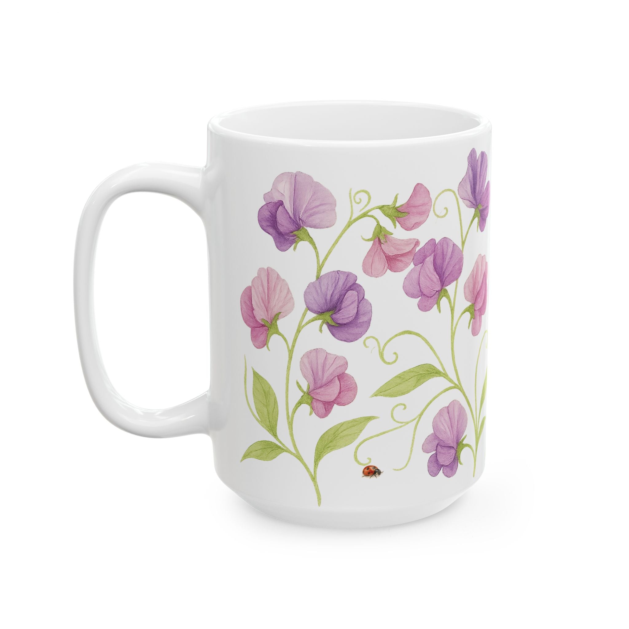 White mug with sweet pea floral design featuring pink and purple flowers on a white background