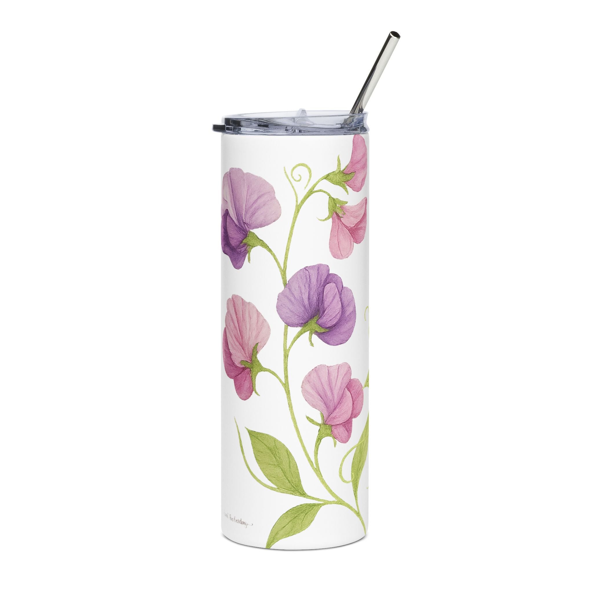 Tumbler with floral design and metal straw on a white background